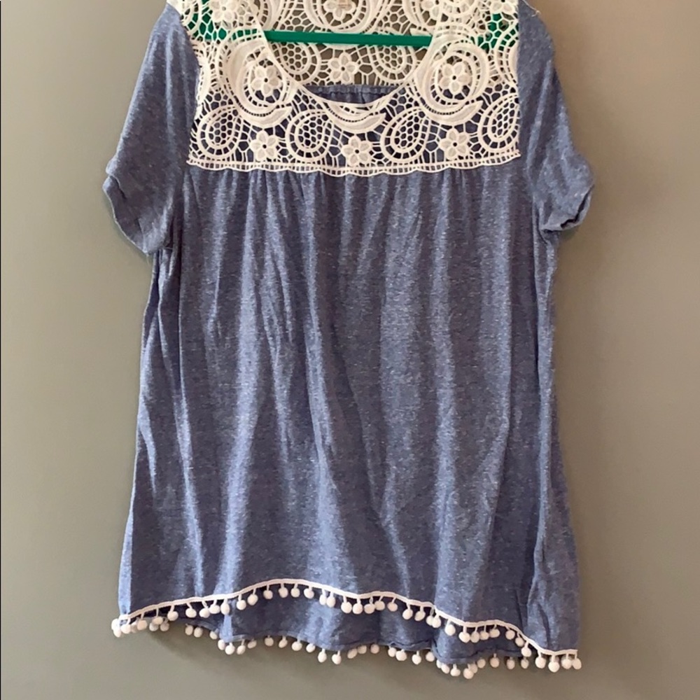 Blue tunic with white floral detail with Pom poms
